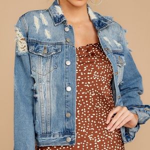 Distressed denim jacket